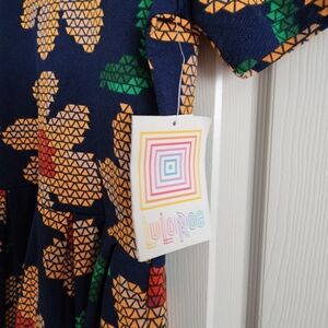 LuLaRoe Navy Dress with Yellow Floral Triangle Print and Green Accents